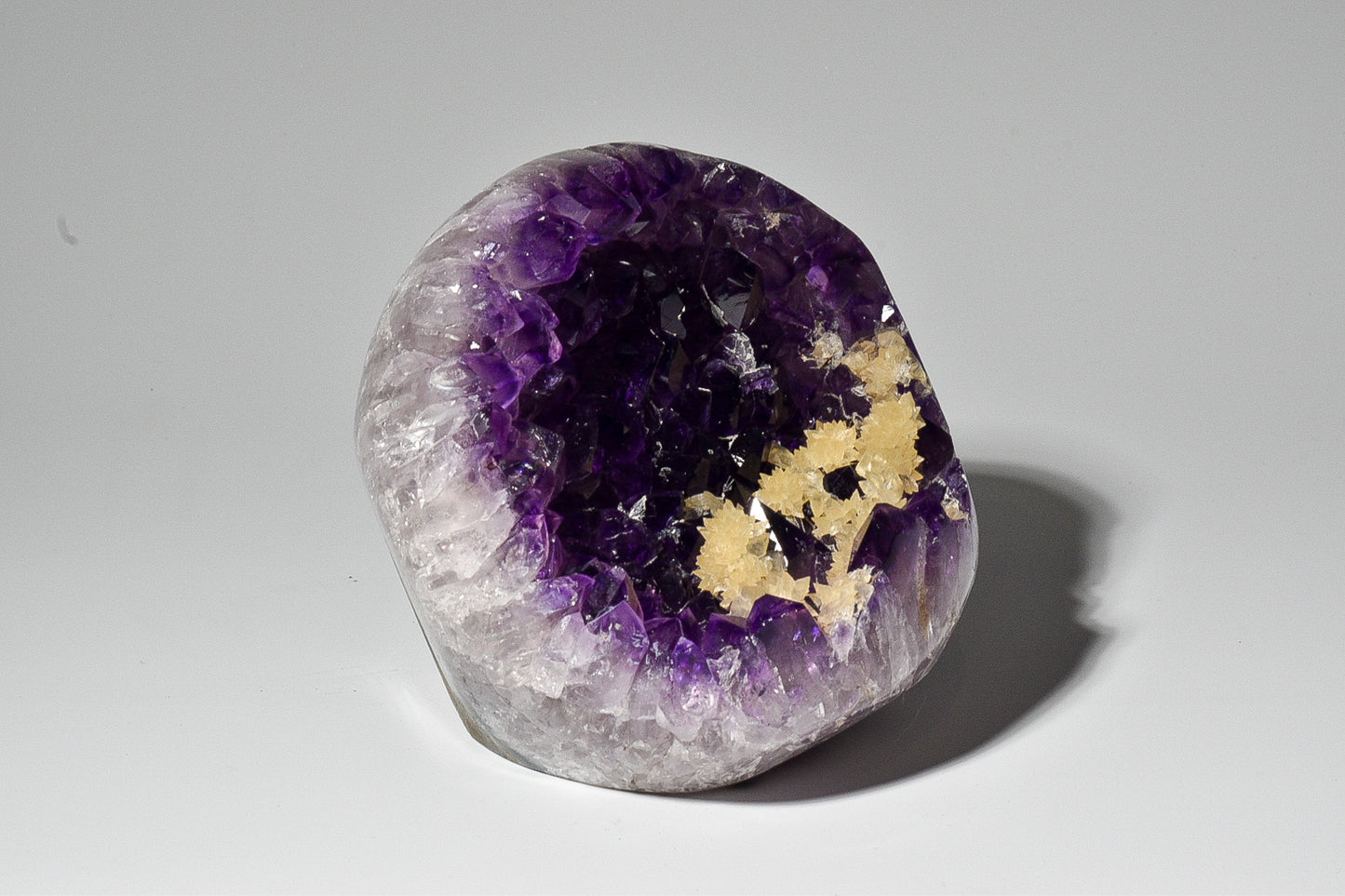 Amethyst natural cut base cluster with calcite flower garden