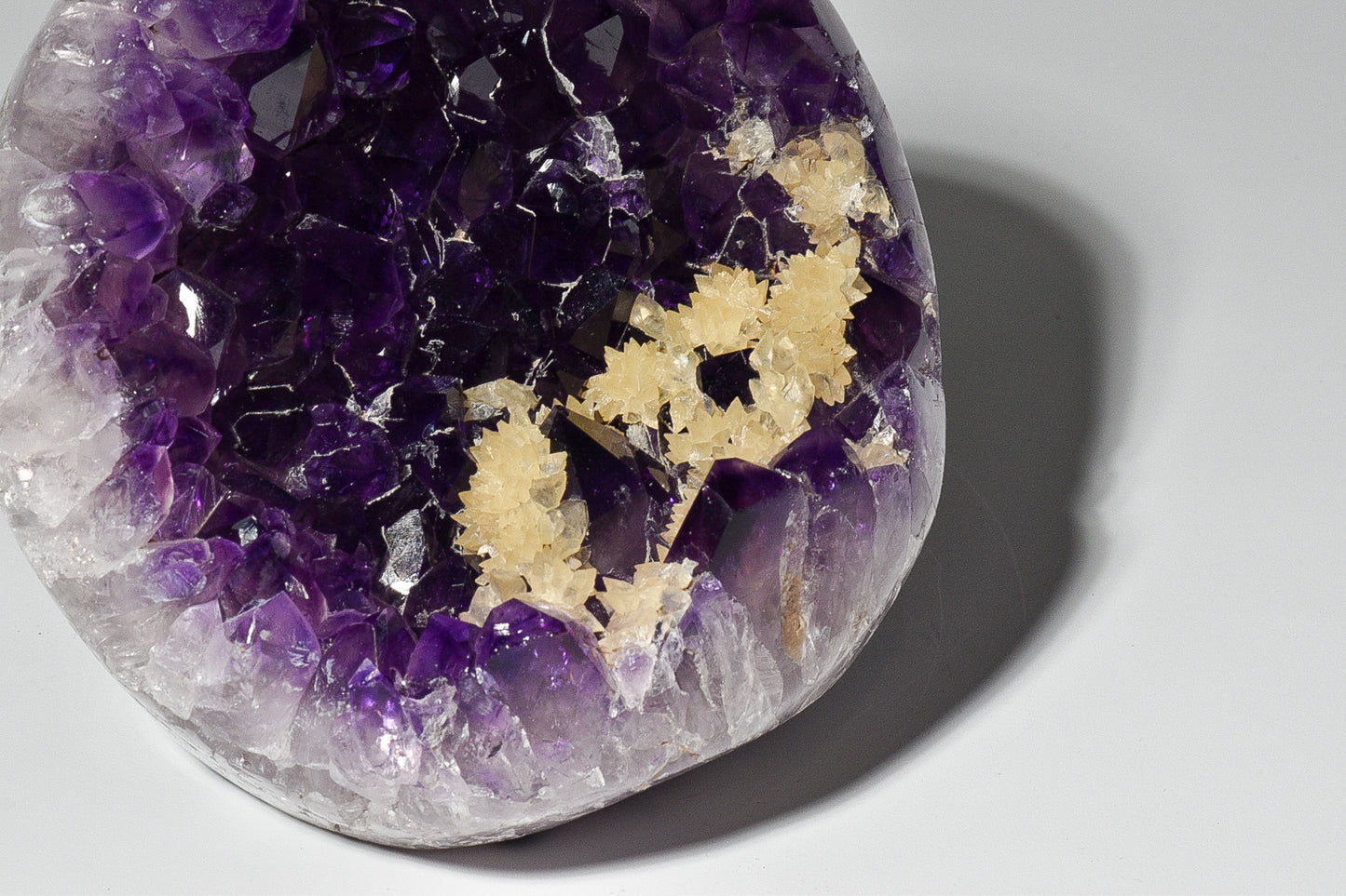 Amethyst natural cut base cluster with calcite flower garden