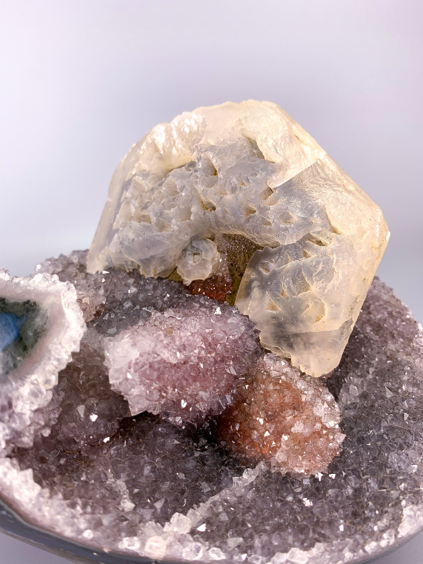 Amethyst natural Fruit Cake cluster with calcite and Hematite