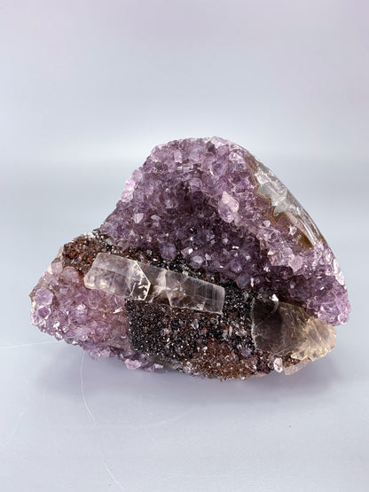 Amethyst natural cluster cut base with calcite and Red/Black Hematite