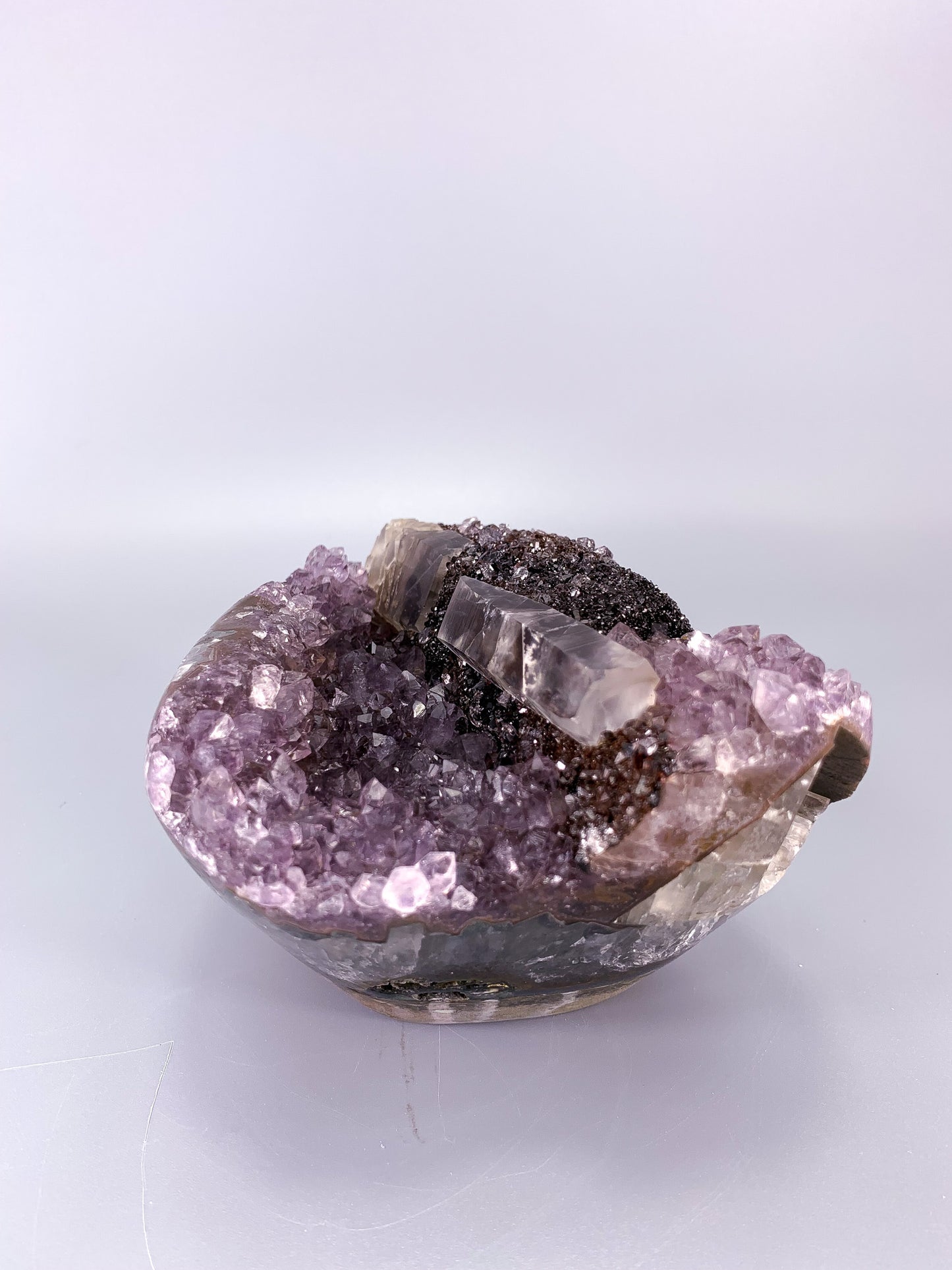 Amethyst natural cluster cut base with calcite and Red/Black Hematite