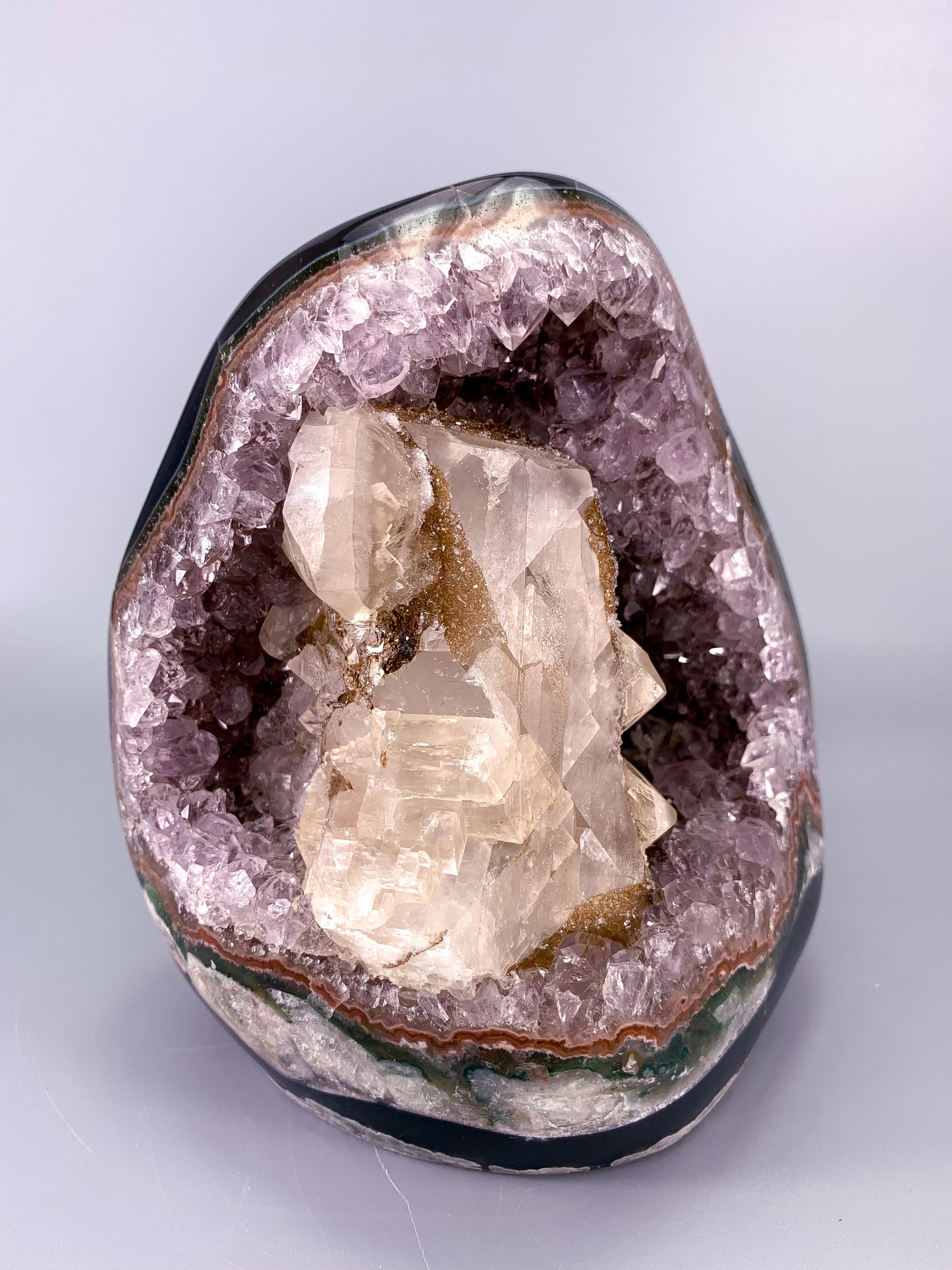 Amethyst natural cluster cut base with calcite and Hematite