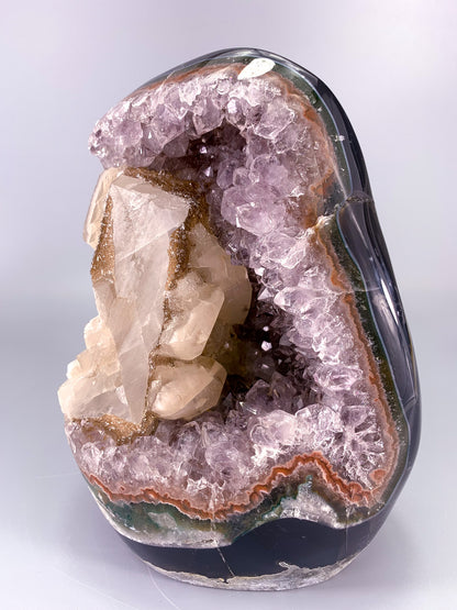 Amethyst natural cluster cut base with calcite and Hematite