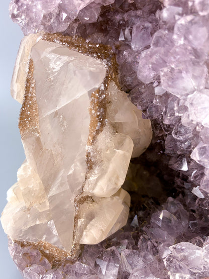 Amethyst natural cluster cut base with calcite and Hematite