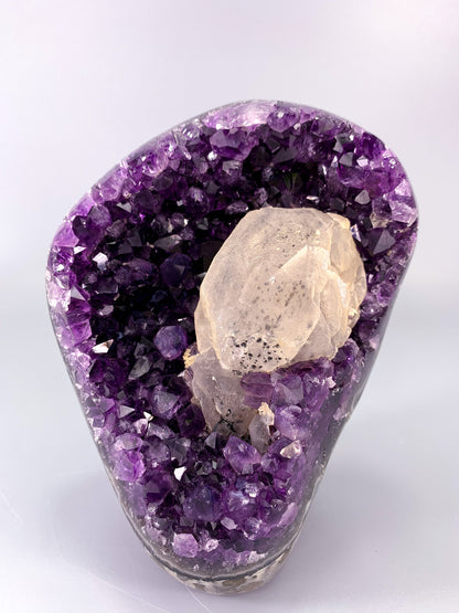 Amethyst natural cut base cluster with calcite