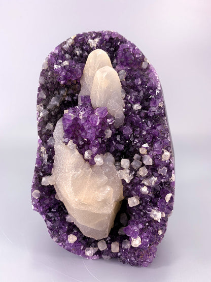 Amethyst natural cluster cut base with calcite and Hematite