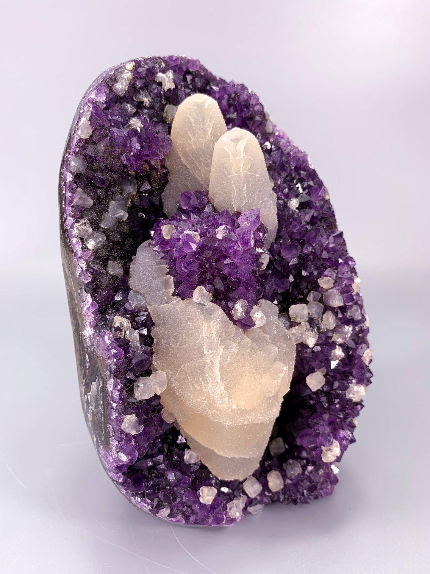 Amethyst natural cluster cut base with calcite and Hematite