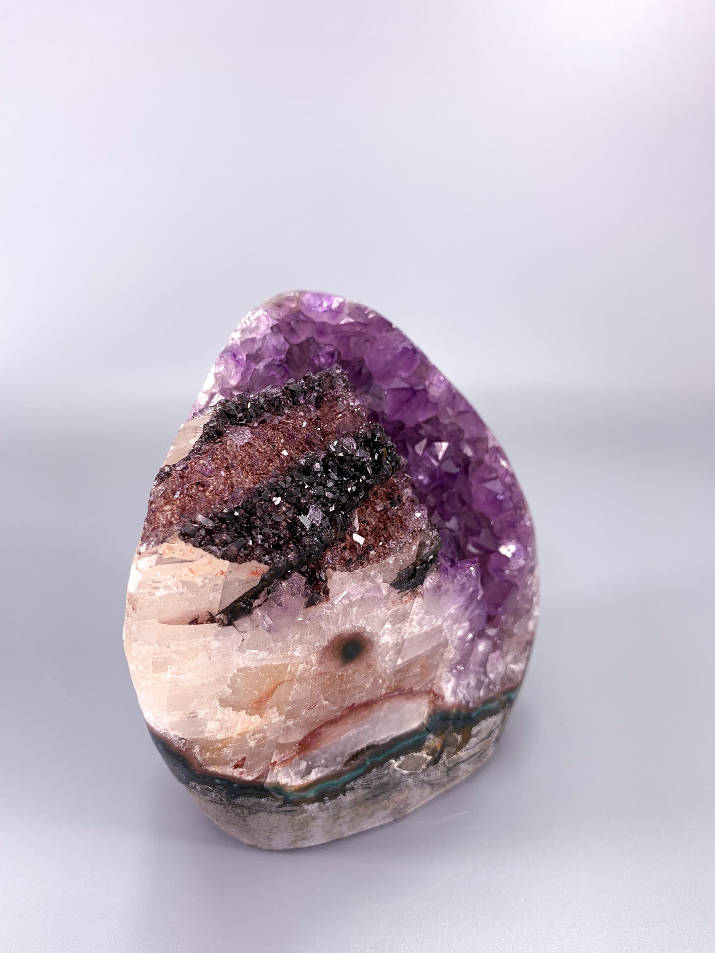 Amethyst natural cluster cut base with calcite and Hematite