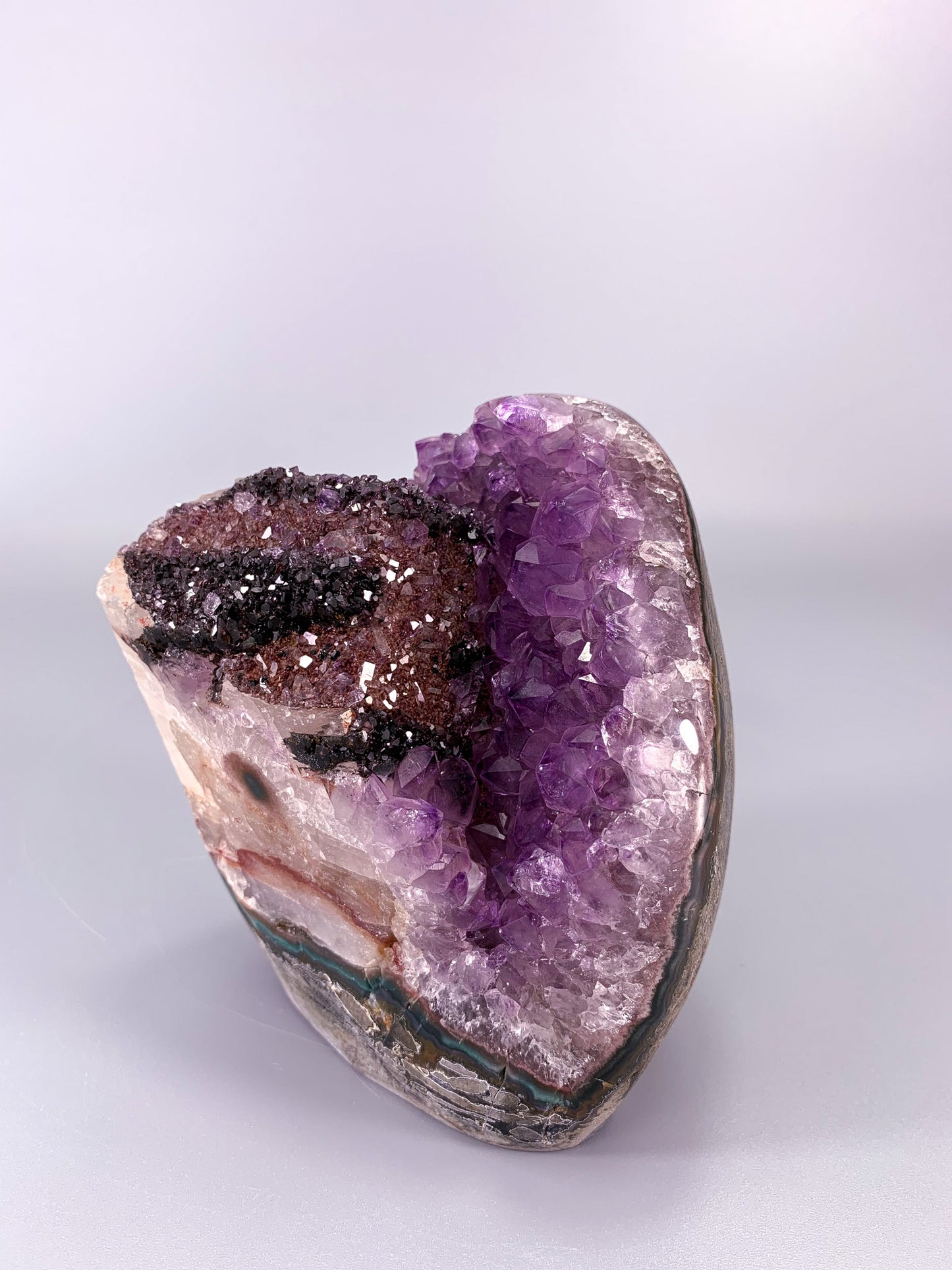 Amethyst natural cluster cut base with calcite and Hematite