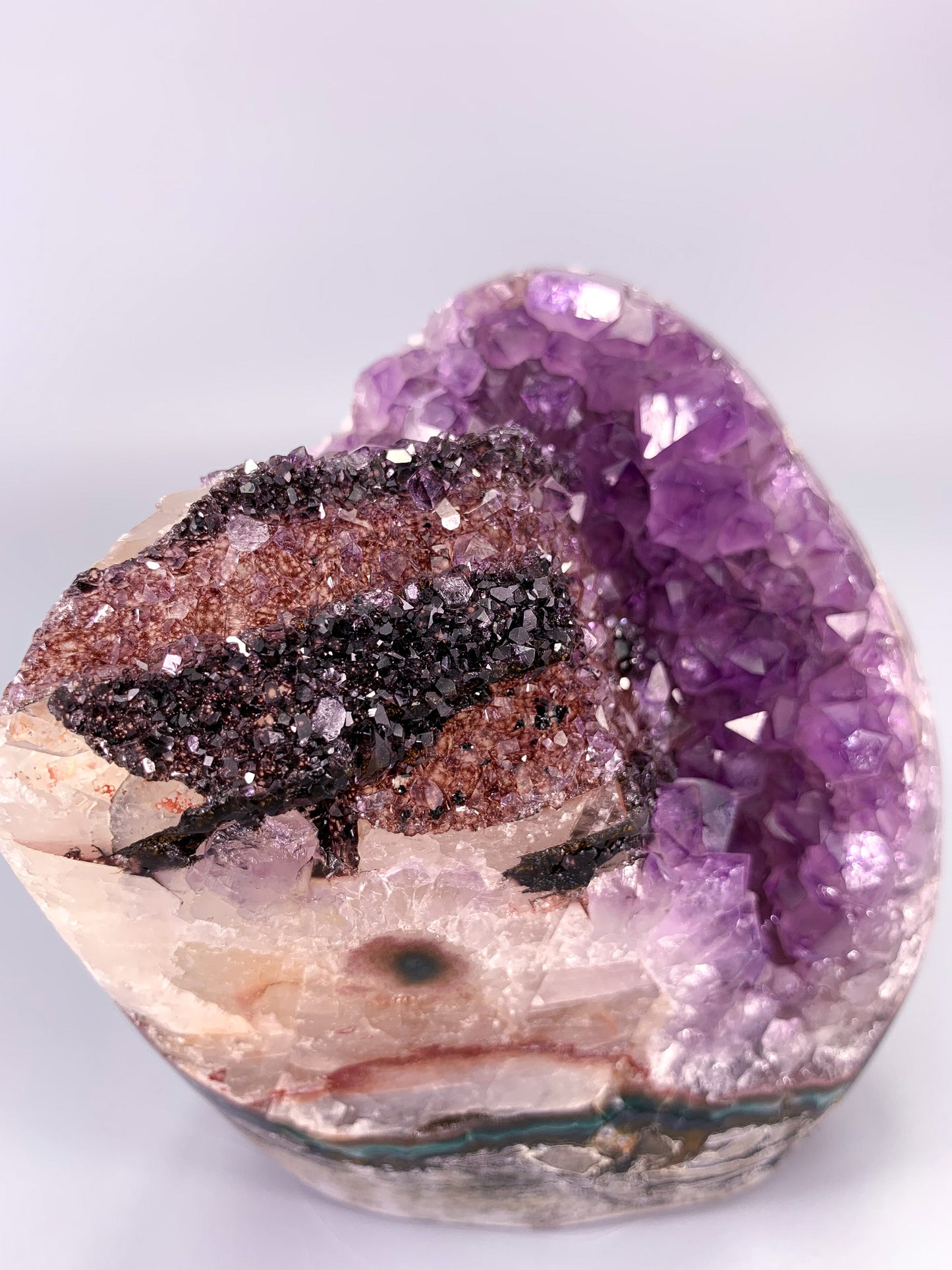 Amethyst natural cluster cut base with calcite and Hematite