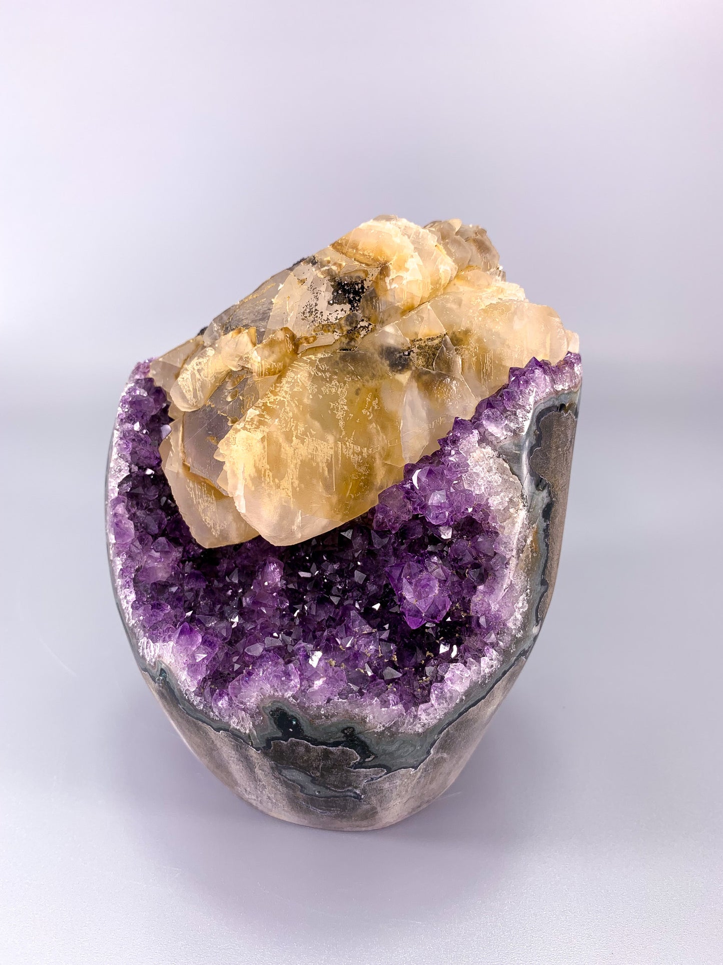 Amethyst natural cluster cut base with calcite and Hematite