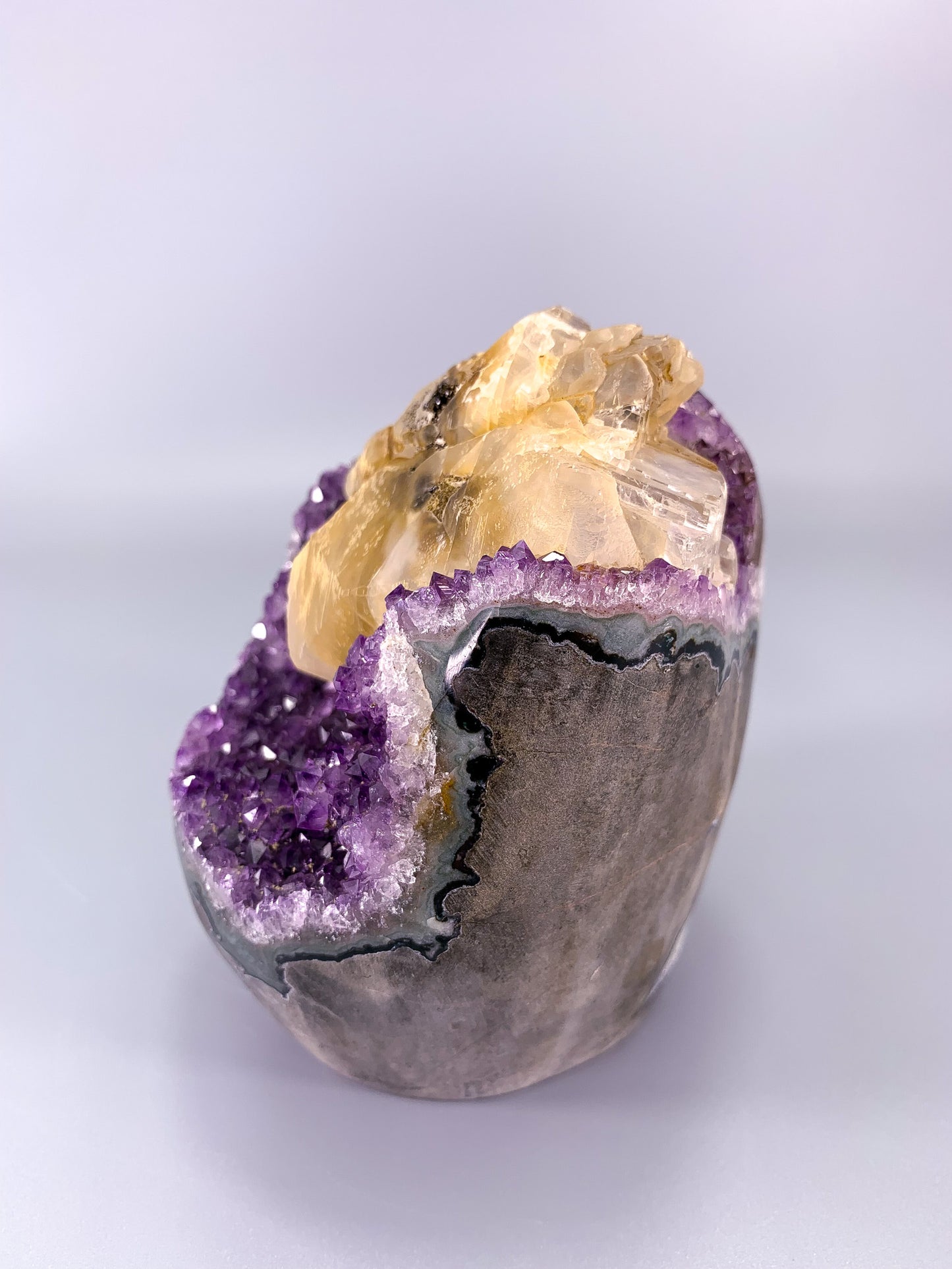 Amethyst natural cluster cut base with calcite and Hematite