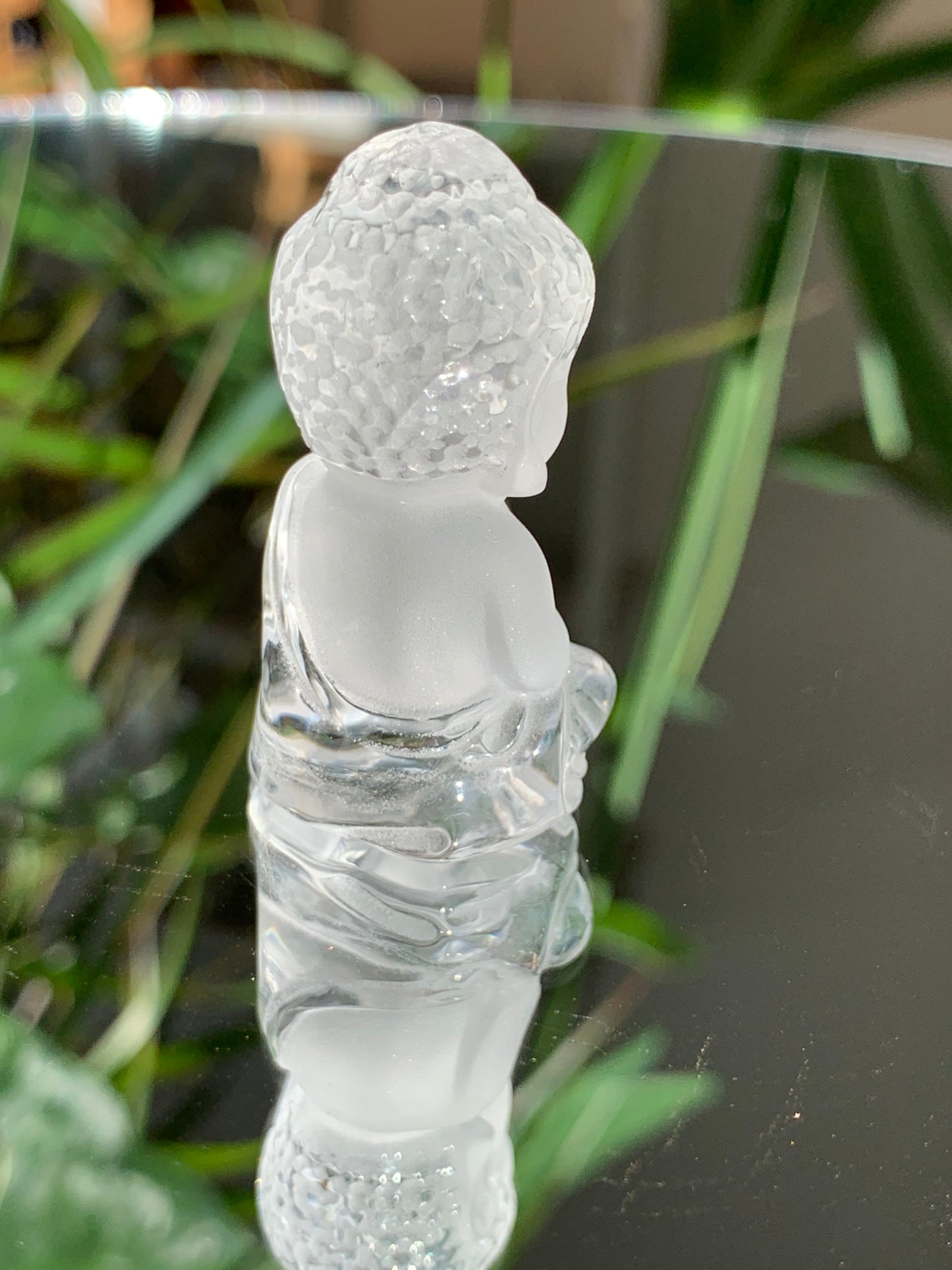 Clear Quartz carved Buddha figure