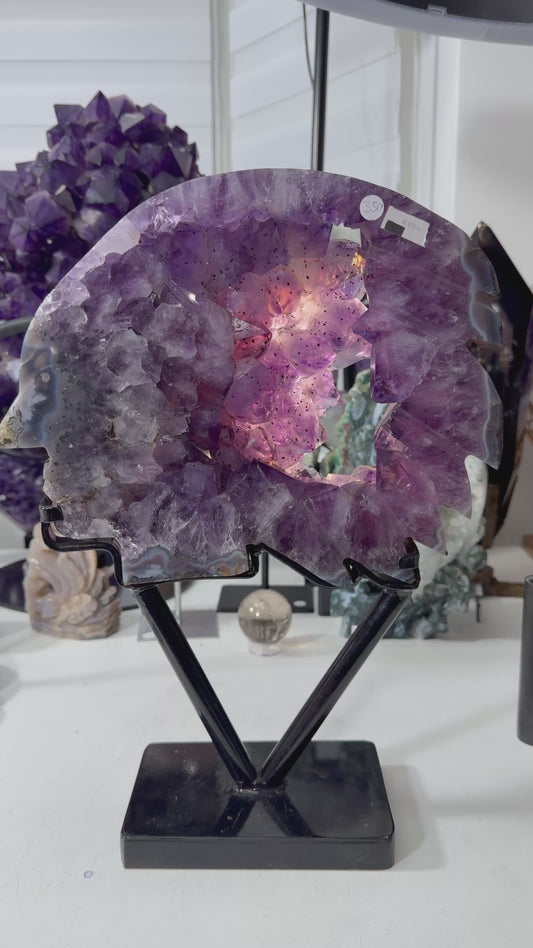 Brazilian Amethyst Indian head carved statement piece on stand