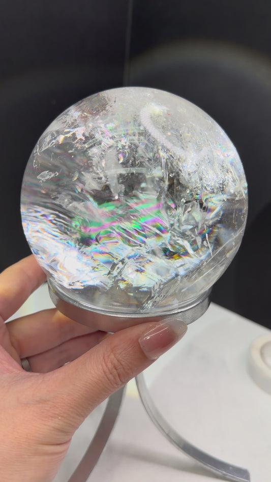 Clear quartz lemurian sphere including stand