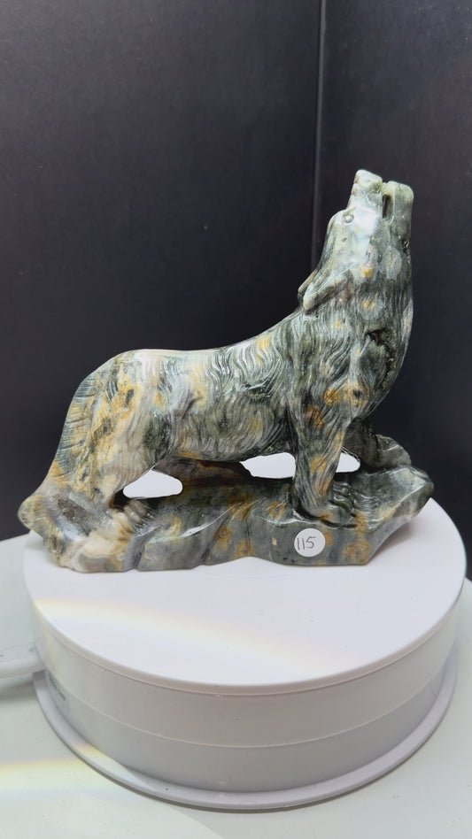 Ocean jasper crystal howling wolf carving with druzy pockets